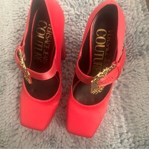 Size 7 Versace platform heels. Brand new never worn.